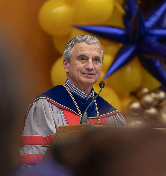 Mark Zupan speaking at commencement